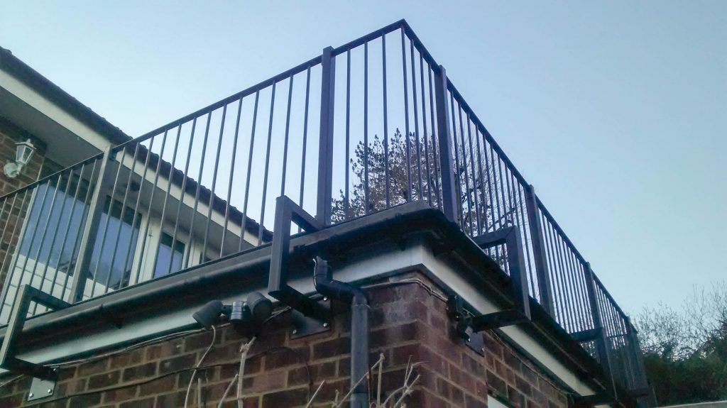Roof balcony railing with custom designed posts